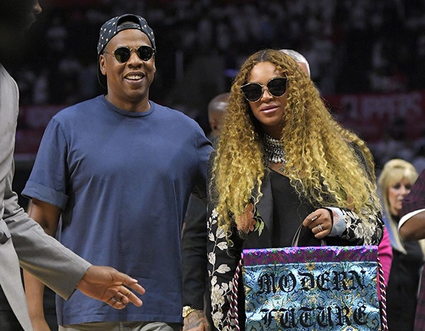 You Gotta See Jay Z Cradling Beyoncé's Baby Bump at the Clippers Game